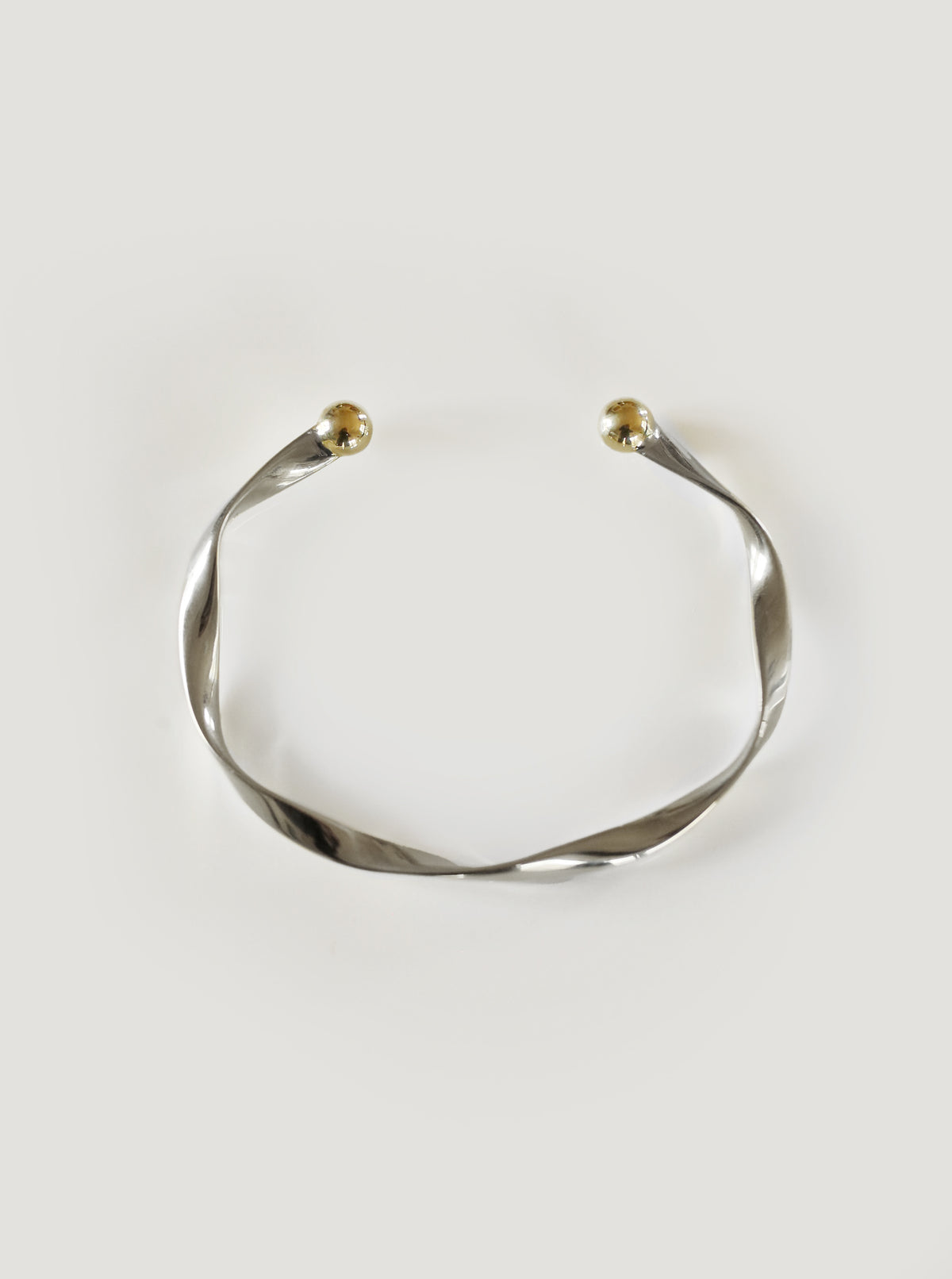 Silver with Gold Ends Kotukutuku Bangle